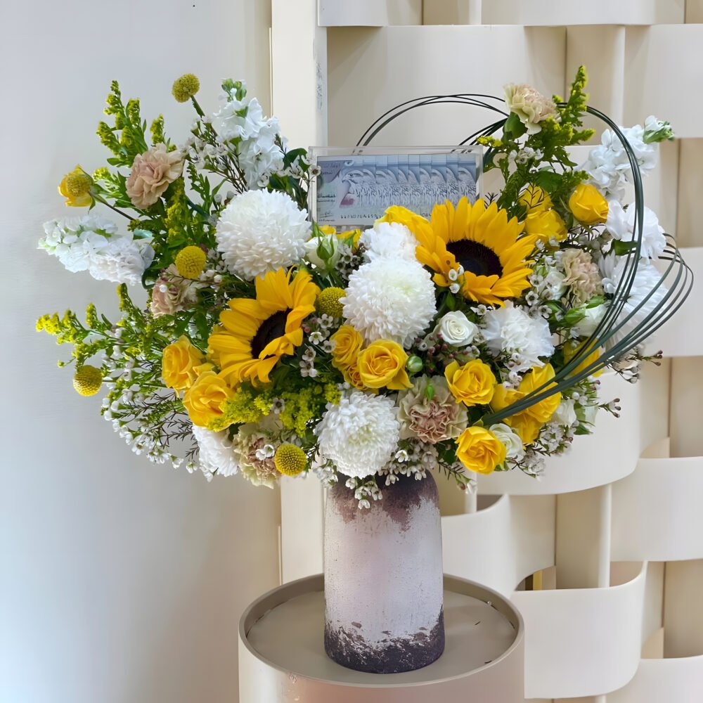 Vase with White and Yellow Flowers