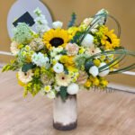 Yellow and White Flowers with Vase