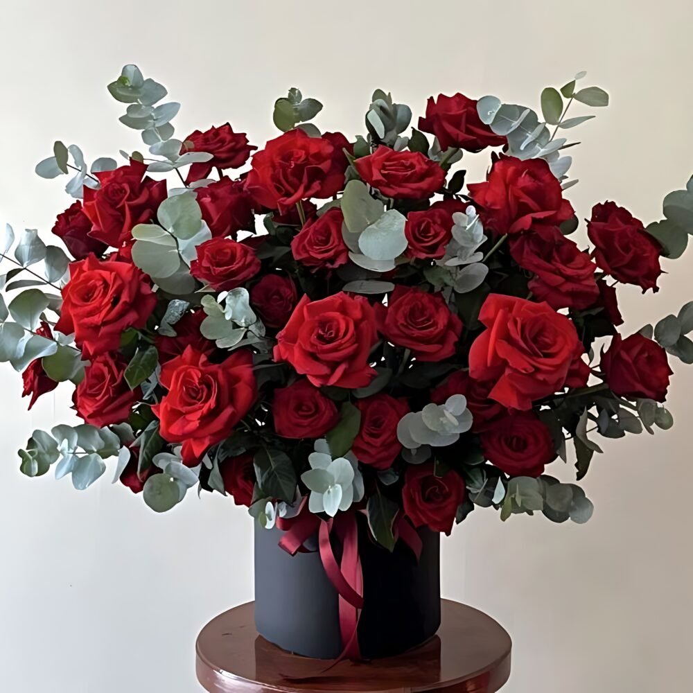 Elegant Black Gift Box with Red & Green Flowers