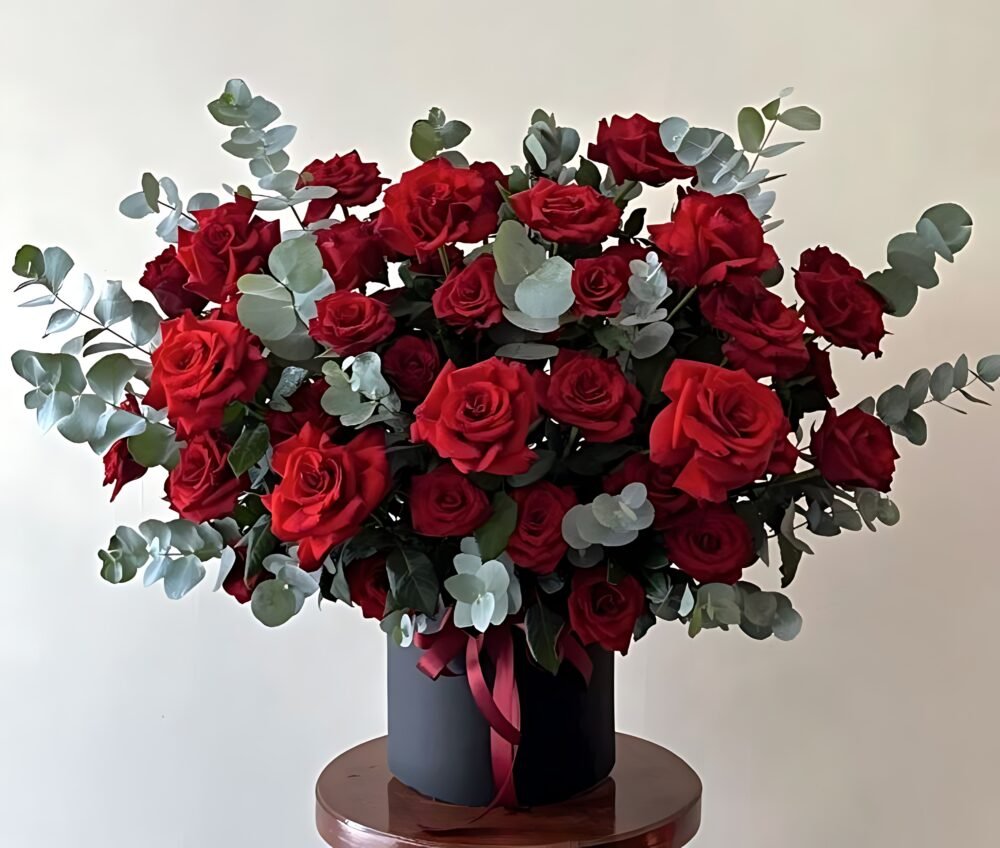 Elegant Black Gift Box with Red & Green Flowers