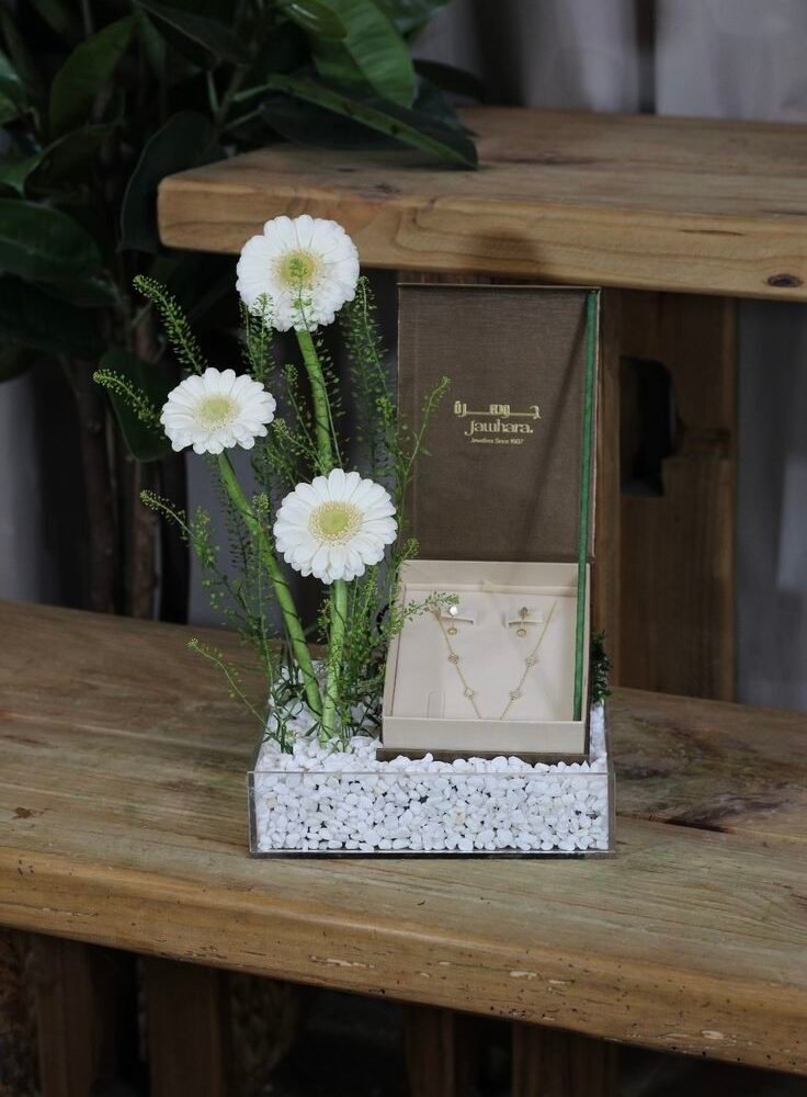 Elegant Jewelry Gift Box with White Floral Arrangement