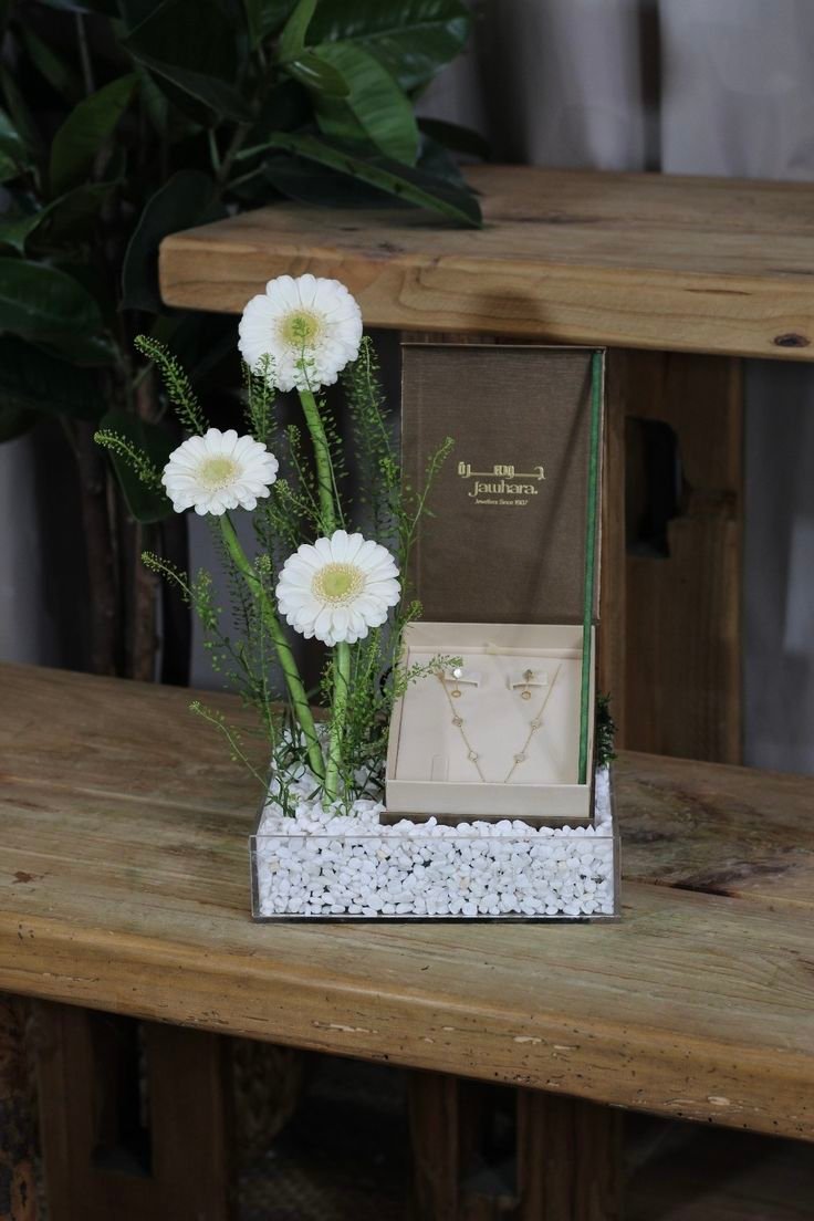 Elegant Jewelry Gift Box with White Floral Arrangement