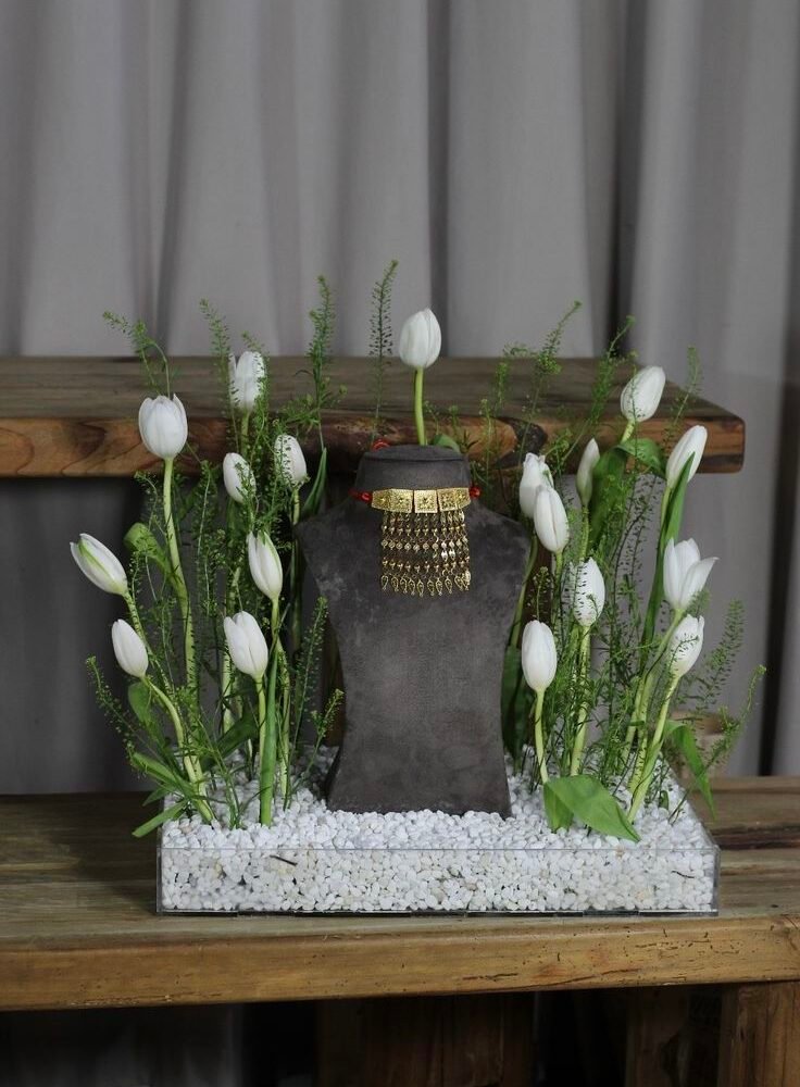 Luxury Jewelry Display with White Tulip Floral Arrangement