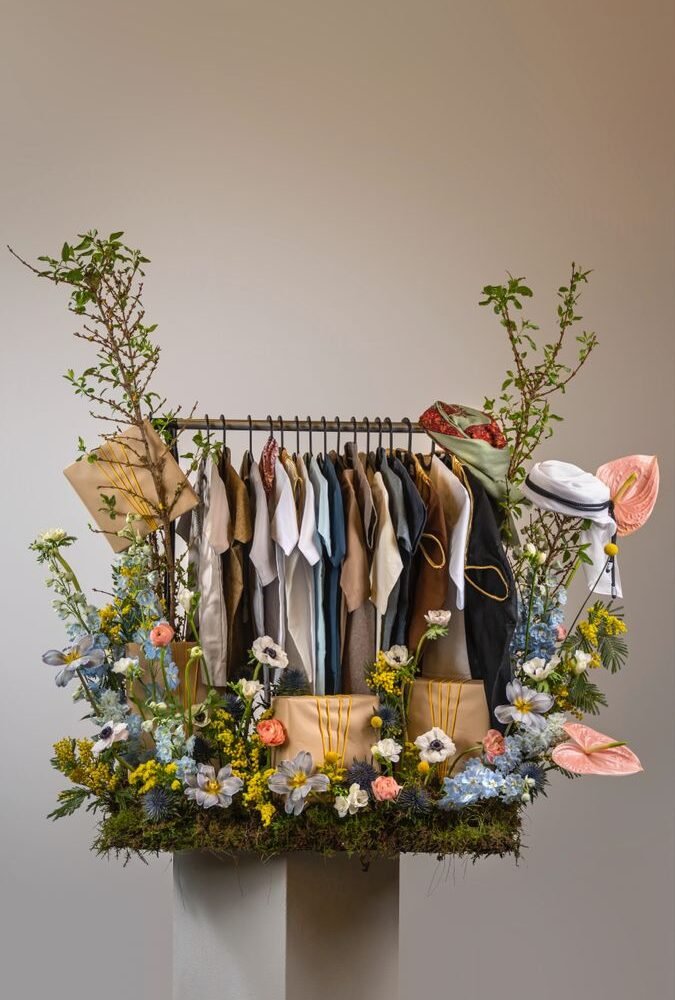 Luxury Baby Clothes & Flower Gift Arrangement
