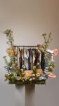 Luxury Baby Clothes & Flower Gift Arrangement