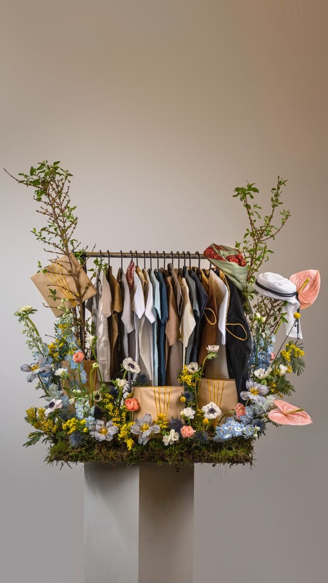 Luxury Baby Clothes & Flower Gift Arrangement