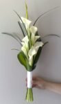 Elegant White Calla Lily Bridal Bouquet with Green Foliage